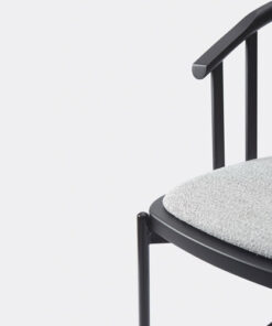 A close up of a chair with a white background